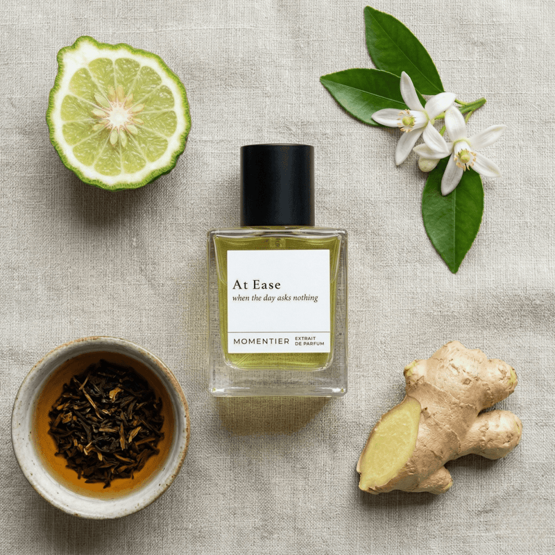 At Ease citrus neroli perfume featuring Sicilian bergamot, Tunisian neroli, ginger, and tea leaves on a linen background.
